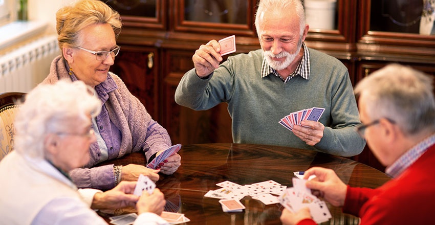 Old people playing cards